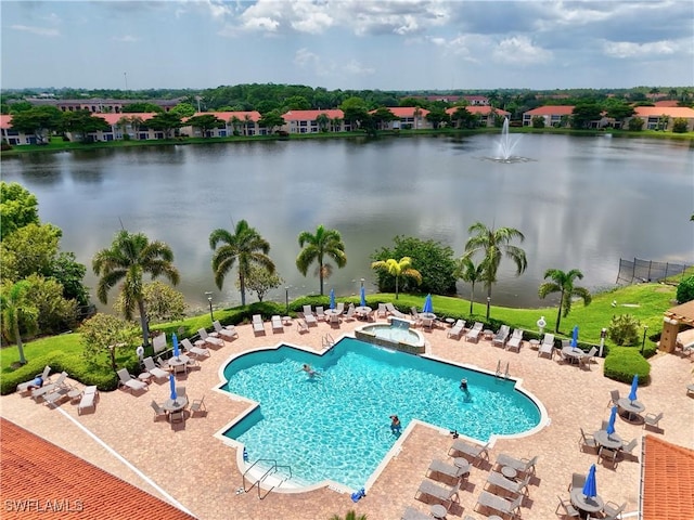 6770 Huntington Lakes Cir Unit 203, Naples, FL 34119 - community pool with a water view and a patio area