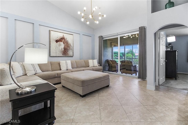 6770 Huntington Lakes Cir Unit 203, Naples, FL 34119 - living area with a chandelier, arched walkways, vaulted ceiling, and light tile patterned flooring