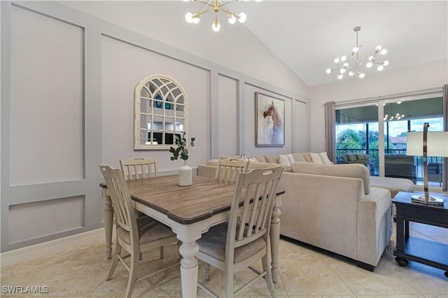 6770 Huntington Lakes Cir Unit 203, Naples, FL 34119 - dining space featuring a chandelier and vaulted ceiling