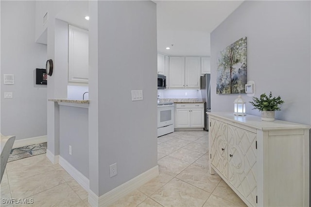 6770 Huntington Lakes Cir Unit 203, Naples, FL 34119 - corridor with recessed lighting and light tile patterned floors