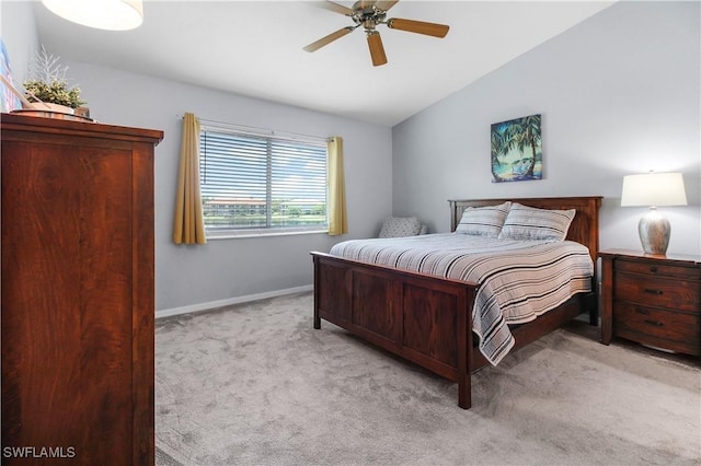 6770 Huntington Lakes Cir Unit 203, Naples, FL 34119 - carpeted bedroom with vaulted ceiling and ceiling fan