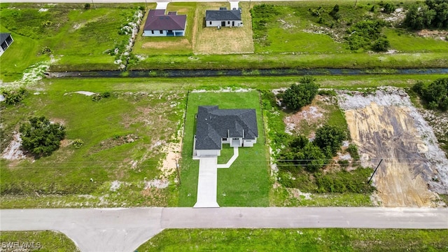 542 Raintree St E, Lehigh Acres, FL 33974 - aerial view of property and surrounding area