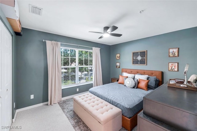5040 Cedar Springs Dr Unit 201, Naples, FL 34110 - carpeted bedroom with baseboards and ceiling fan