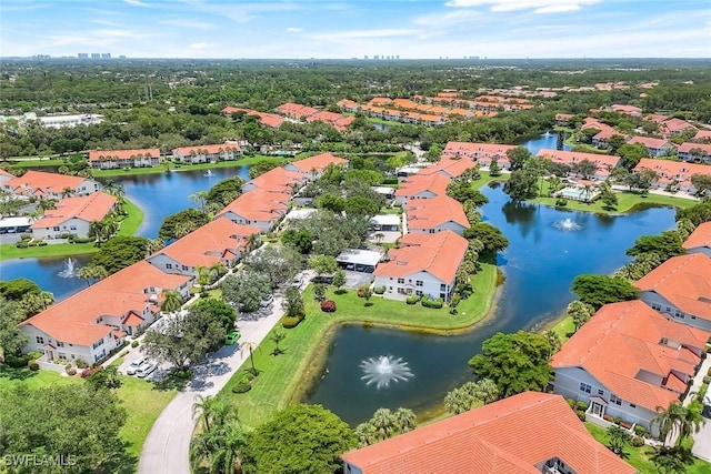 5040 Cedar Springs Dr Unit 201, Naples, FL 34110 - aerial perspective of suburban area featuring a large body of water