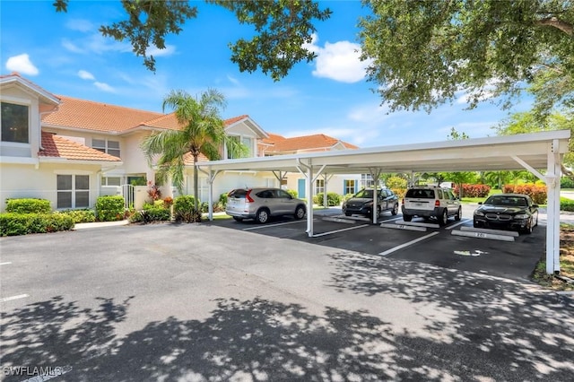 5040 Cedar Springs Dr Unit 201, Naples, FL 34110 - view of covered parking lot