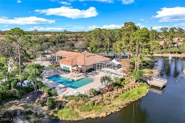 5040 Cedar Springs Dr Unit 201, Naples, FL 34110 - aerial view of property and surrounding area featuring a pool and a large body of water