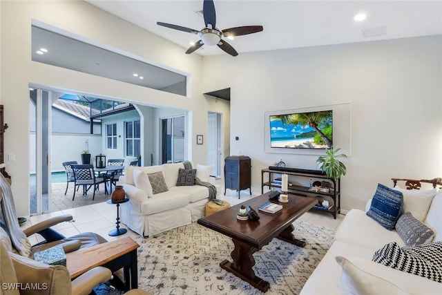 4333 Mistlethrush Ln, Naples, FL 34119 - living room with ceiling fan, light tile patterned flooring, recessed lighting, and lofted ceiling