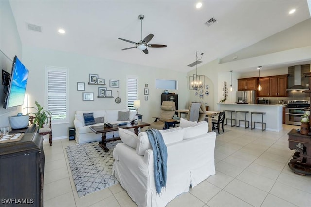 4333 Mistlethrush Ln, Naples, FL 34119 - living area featuring lofted ceiling, a ceiling fan, light tile patterned floors, recessed lighting, and a chandelier