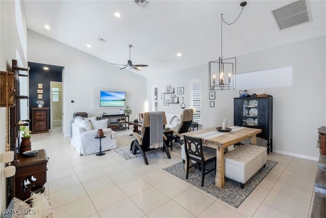 4333 Mistlethrush Ln, Naples, FL 34119 - dining room with lofted ceiling, light tile patterned floors, a chandelier, ceiling fan, and recessed lighting