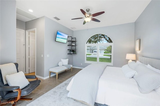 4333 Mistlethrush Ln, Naples, FL 34119 - bedroom with tile patterned floors and ceiling fan