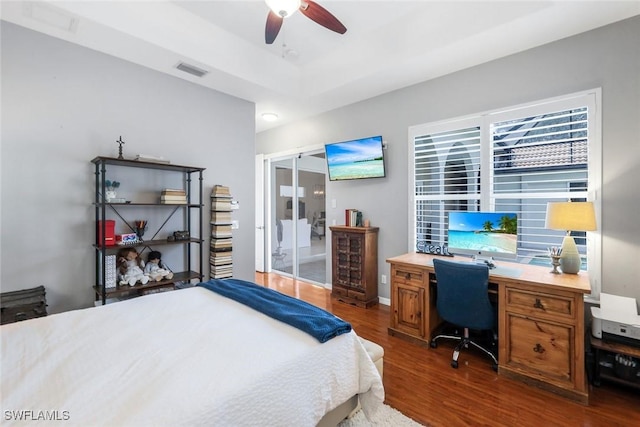 4333 Mistlethrush Ln, Naples, FL 34119 - bedroom with dark wood-style floors, a closet, a ceiling fan, and an office area