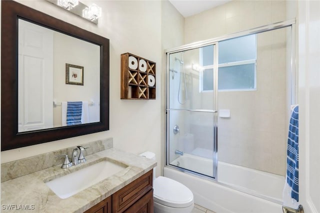 4333 Mistlethrush Ln, Naples, FL 34119 - full bathroom with vanity and bath / shower combo with glass door