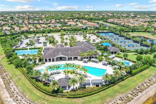4406 Caldera Cir, Naples, FL 34119 - drone / aerial view of a pool area