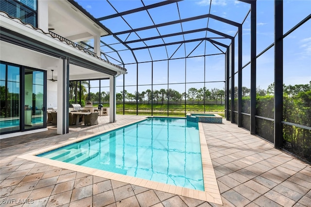 4406 Caldera Cir, Naples, FL 34119 - view of swimming pool with a patio area, a pool with connected hot tub, and glass enclosure