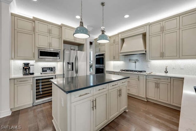 4406 Caldera Cir, Naples, FL 34119 - kitchen featuring stainless steel appliances, premium range hood, wine cooler, backsplash, and wood finished floors