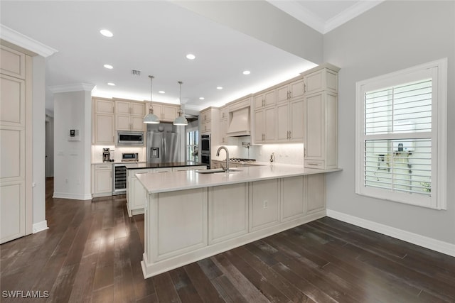 4406 Caldera Cir, Naples, FL 34119 - kitchen featuring stainless steel appliances, a peninsula, ornamental molding, wine cooler, and dark wood-type flooring