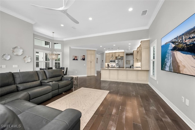 4406 Caldera Cir, Naples, FL 34119 - living area with ceiling fan, dark wood finished floors, ornamental molding, and recessed lighting