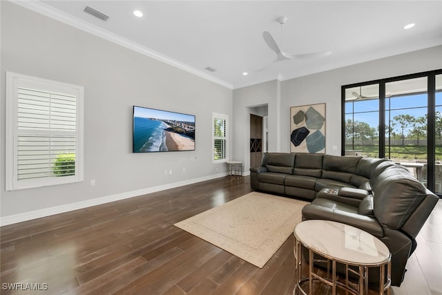 4406 Caldera Cir, Naples, FL 34119 - living area featuring dark wood-style flooring, healthy amount of natural light, recessed lighting, crown molding, and a ceiling fan