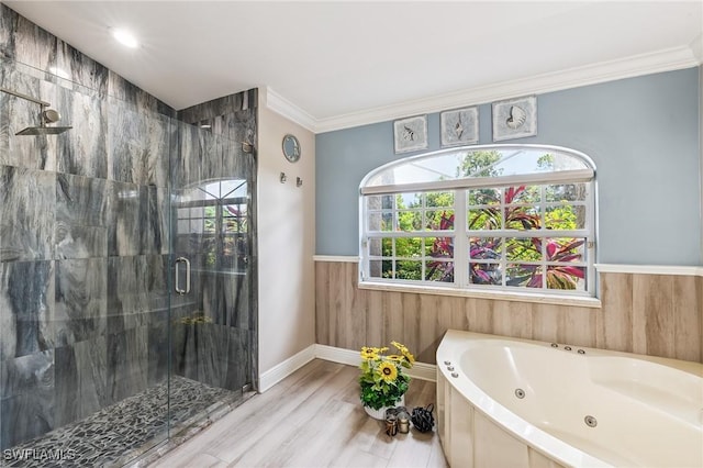11840 Longshore Way W, Naples, FL 34119 - full bath featuring a stall shower, a whirlpool tub, crown molding, a wainscoted wall, and wood finished floors