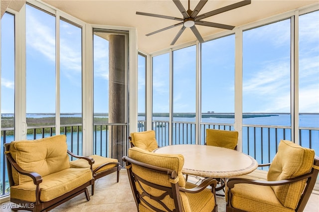 4137 Bay Beach Ln Unit 5P2, Fort Myers Beach, FL 33931 - sunroom featuring a water view, floor to ceiling windows, and tile patterned floors
