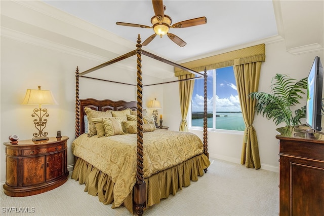 4137 Bay Beach Ln Unit 5P2, Fort Myers Beach, FL 33931 - bedroom with light carpet, ornamental molding, and a ceiling fan