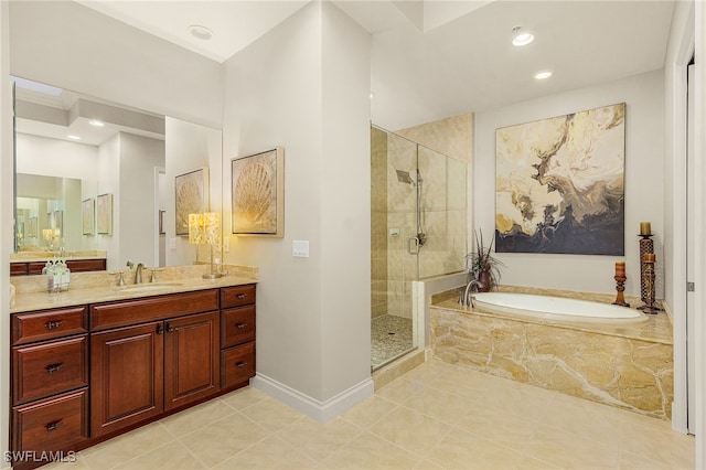 4137 Bay Beach Ln Unit 5P2, Fort Myers Beach, FL 33931 - bathroom with a bath, vanity, a stall shower, tile patterned floors, and recessed lighting