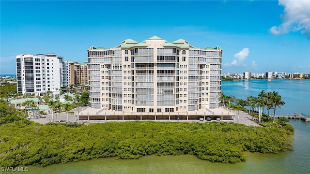 4137 Bay Beach Ln Unit 5P2, Fort Myers Beach, FL 33931 - view of apartment building / complex with a water view