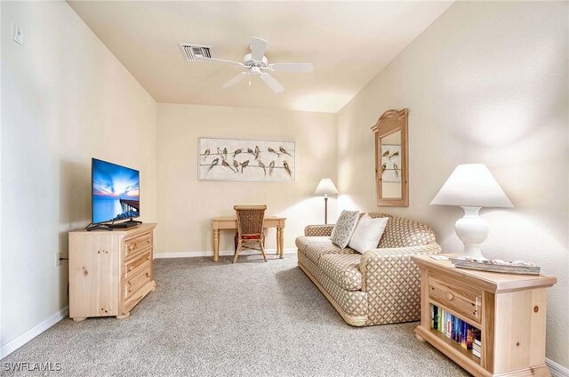 7905 Mahogany Run Ln Unit 1324, Naples, FL 34113 - carpeted living room with a ceiling fan and baseboards