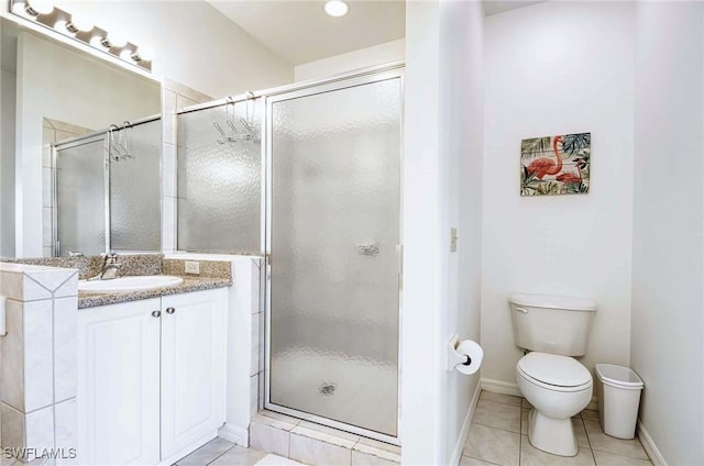 7905 Mahogany Run Ln Unit 1324, Naples, FL 34113 - bathroom with vanity, tile patterned floors, and a stall shower