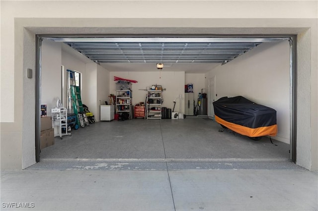 2642 10th Ave NE, Naples, FL 34120 - garage featuring a garage door opener