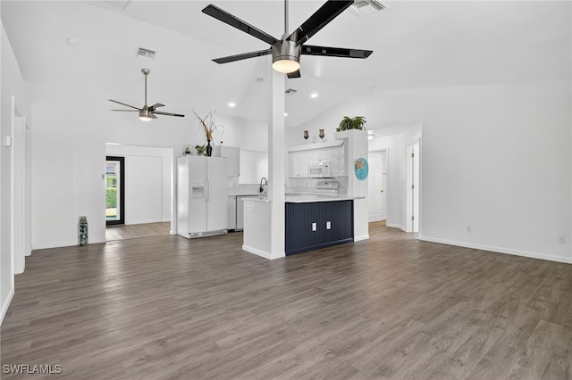 1905 SW 11th St, Cape Coral, FL 33991 - unfurnished living room with a ceiling fan, high vaulted ceiling, dark wood finished floors, and recessed lighting