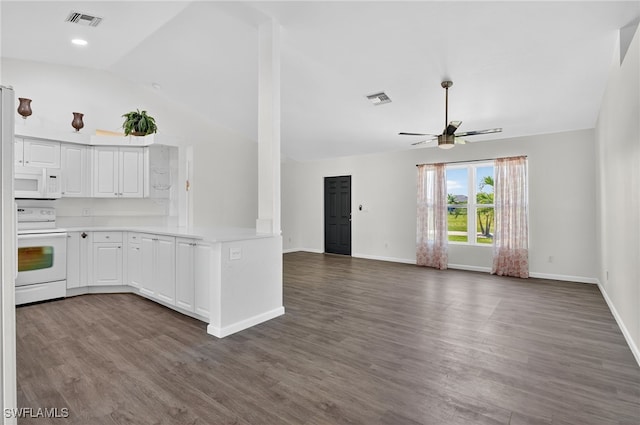 1905 SW 11th St, Cape Coral, FL 33991 - kitchen featuring white appliances, ceiling fan, vaulted ceiling, light countertops, and white cabinets