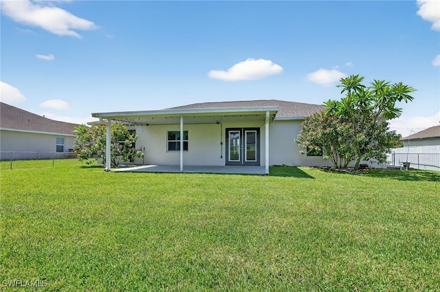 1905 SW 11th St, Cape Coral, FL 33991 - rear view of house featuring stucco siding and a patio