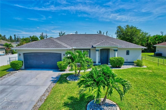 1905 SW 11th St, Cape Coral, FL 33991 - single story home with stucco siding, driveway, an attached garage, and roof with shingles