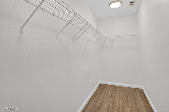 1905 SW 11th St, Cape Coral, FL 33991 - spacious closet with wood finished floors