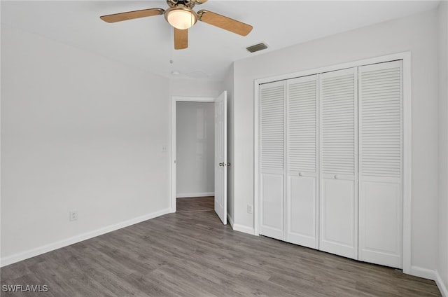 1905 SW 11th St, Cape Coral, FL 33991 - unfurnished bedroom featuring wood finished floors, a closet, and ceiling fan