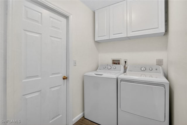 1905 SW 11th St, Cape Coral, FL 33991 - washroom with washer and dryer, cabinet space, and dark wood finished floors