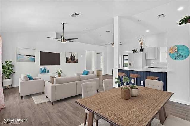1905 SW 11th St, Cape Coral, FL 33991 - dining room with ceiling fan, vaulted ceiling, wood finished floors, and recessed lighting