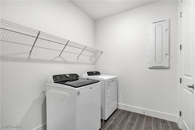 16272 Wax Myrtle St, Punta Gorda, FL 33982 - laundry area featuring electric panel, washing machine and clothes dryer, and wood finish floors