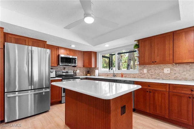 18381 Panther Trail Ln, North Fort Myers, FL 33917 - kitchen with appliances with stainless steel finishes, light countertops, recessed lighting, backsplash, and brown cabinets