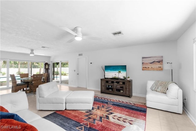 18381 Panther Trail Ln, North Fort Myers, FL 33917 - living area with tile patterned floors and a ceiling fan
