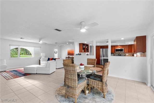 18381 Panther Trail Ln, North Fort Myers, FL 33917 - dining room featuring ceiling fan, light tile patterned floors, and recessed lighting