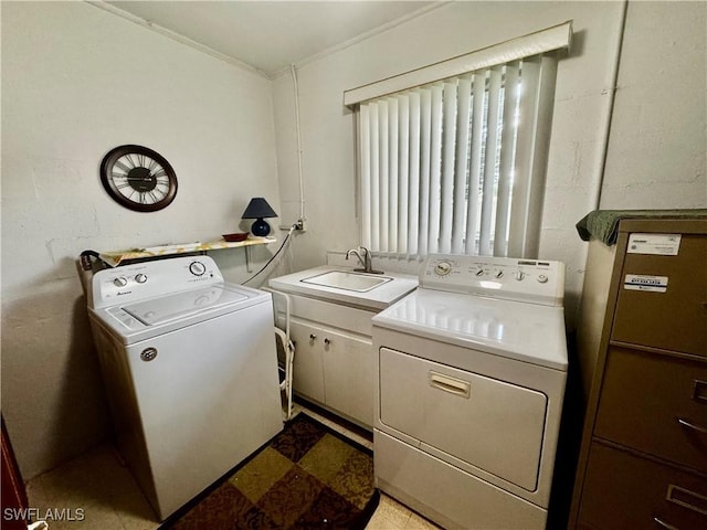 1427 Charles Rd, Fort Myers, FL 33919 - laundry area featuring washing machine and dryer, light flooring, and crown molding