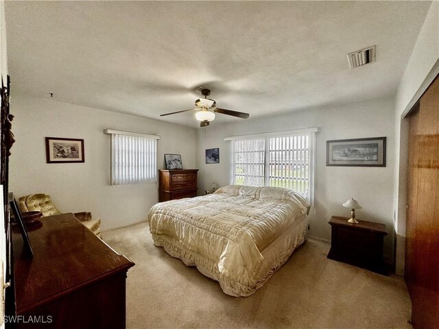 1427 Charles Rd, Fort Myers, FL 33919 - carpeted bedroom featuring a ceiling fan