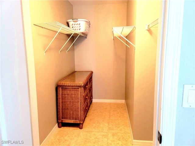 4619 SW 20th Pl, Cape Coral, FL 33914 - walk in closet featuring light tile patterned floors