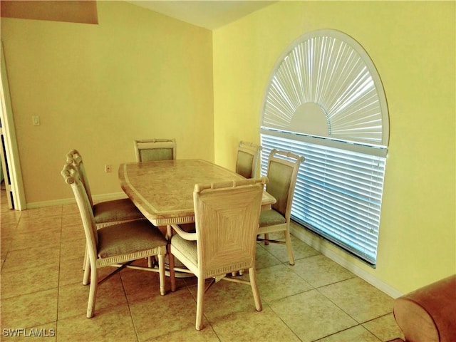 4619 SW 20th Pl, Cape Coral, FL 33914 - dining room with light tile patterned flooring and baseboards