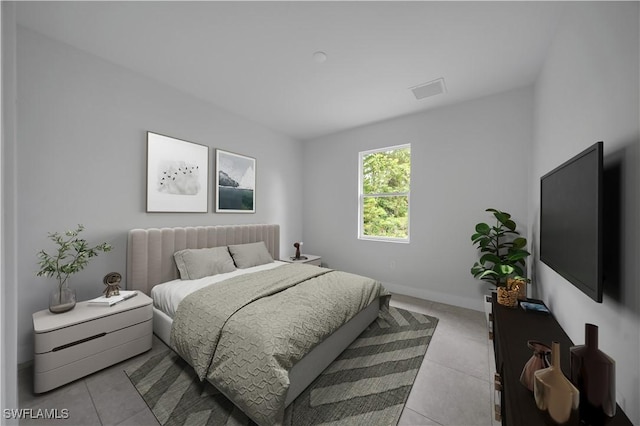933 Anthony St E, Lehigh Acres, FL 33974 - bedroom with light tile patterned floors