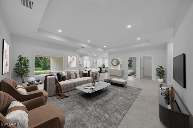 933 Anthony St E, Lehigh Acres, FL 33974 - living area featuring a raised ceiling, recessed lighting, and light tile patterned floors
