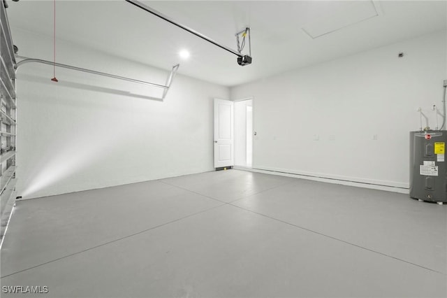 726 Cardinal St E, Lehigh Acres, FL 33974 - garage featuring water heater and a garage door opener
