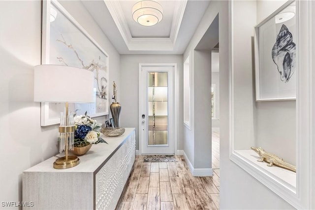 3829 Helmsman Dr, Naples, FL 34120 - entryway featuring a raised ceiling, light wood finished floors, and crown molding